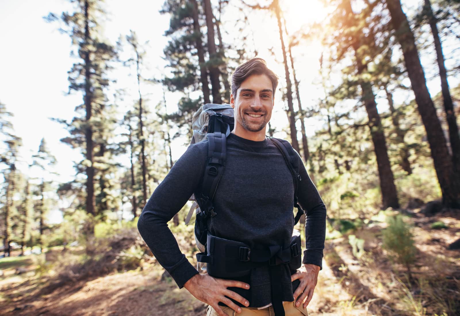 young man hiking in a forest, LASIK Brisbane