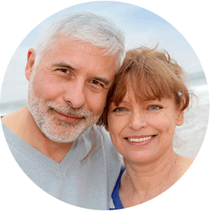 Headshot of Troy and Liana Todd, saying how his wife enjoy great vision without glasses and contact lenses after having eye surgery with VSON